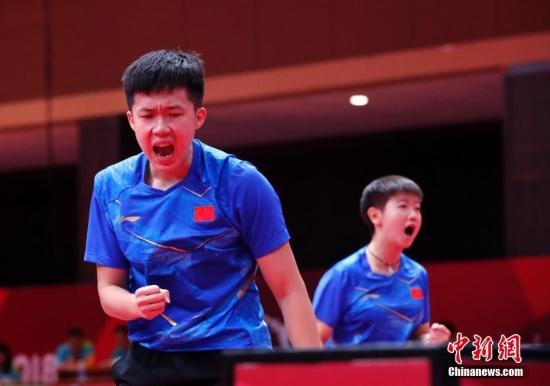 資料圖：雅加達(dá)亞運(yùn)會(huì)，王楚欽/孫穎莎奪得混雙冠軍。 <a target='_blank' href='/'>中新社</a>記者 劉關(guān)關(guān) 攝