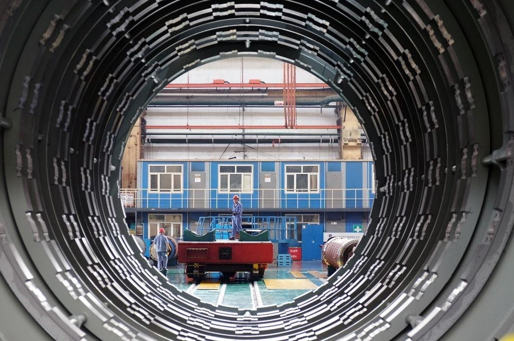 △2023年8月31日，工人在哈電集團哈爾濱電機廠有限責任公司的水電分廠重型車間作業(yè)。