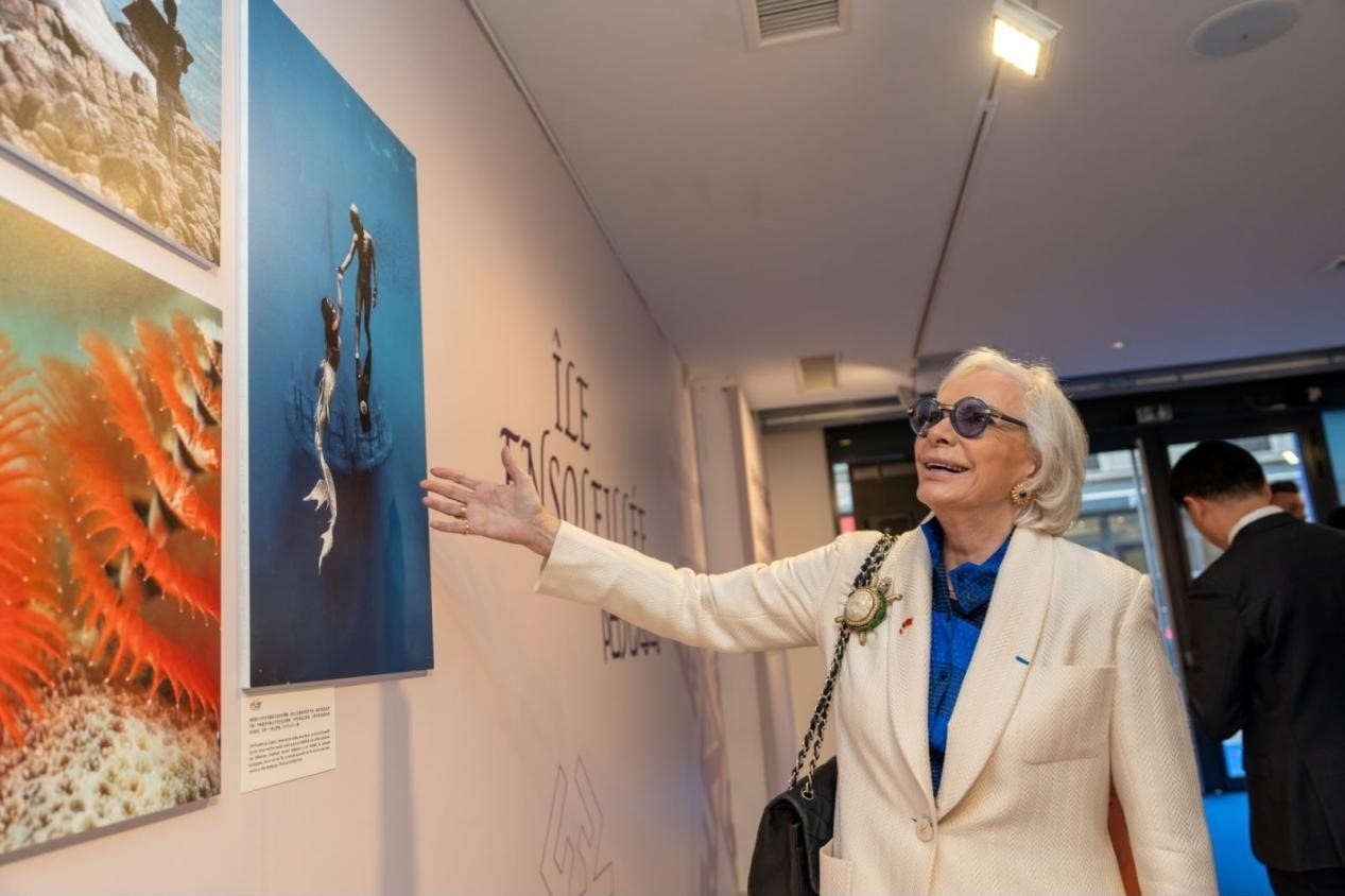 世界旅游組織特別顧問瑪麗-皮埃爾·布歇-奧利耶觀看活動現(xiàn)場圖片展覽?；顒又鬓k方供圖