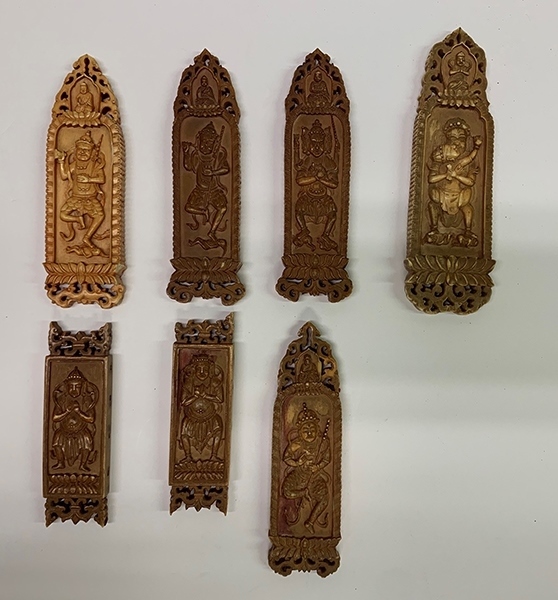 木雕牌飾（暫定名）。國家文物局供圖