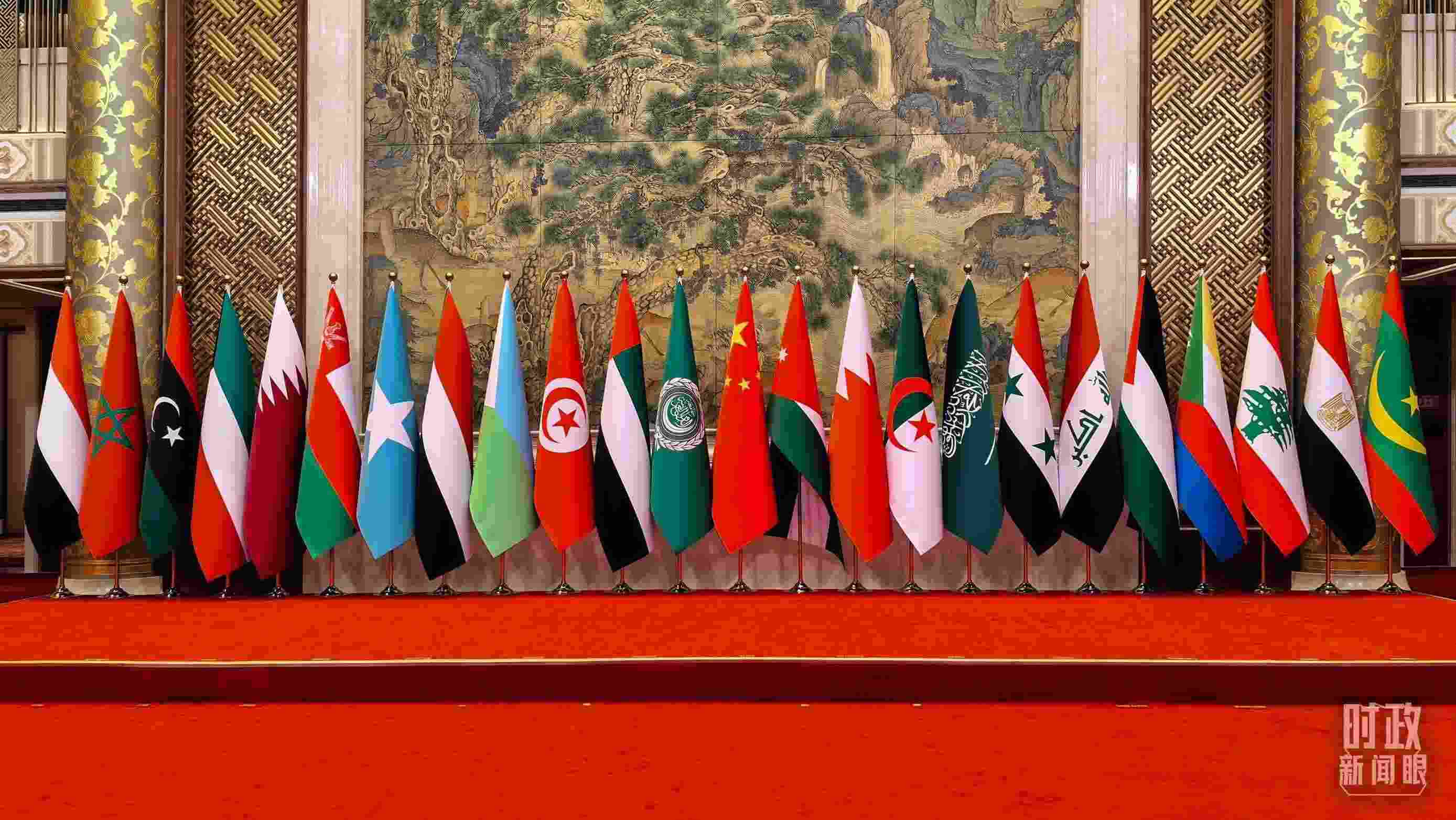 △會議現(xiàn)場的集體合影區(qū)。（總臺央廣記者潘毅拍攝）