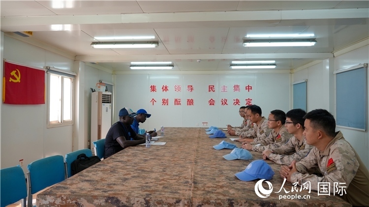 圖1 檢查組聽取工作匯報。王軍杰攝