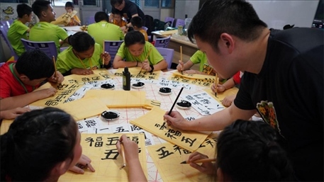 書法教學(xué)。主辦方供圖