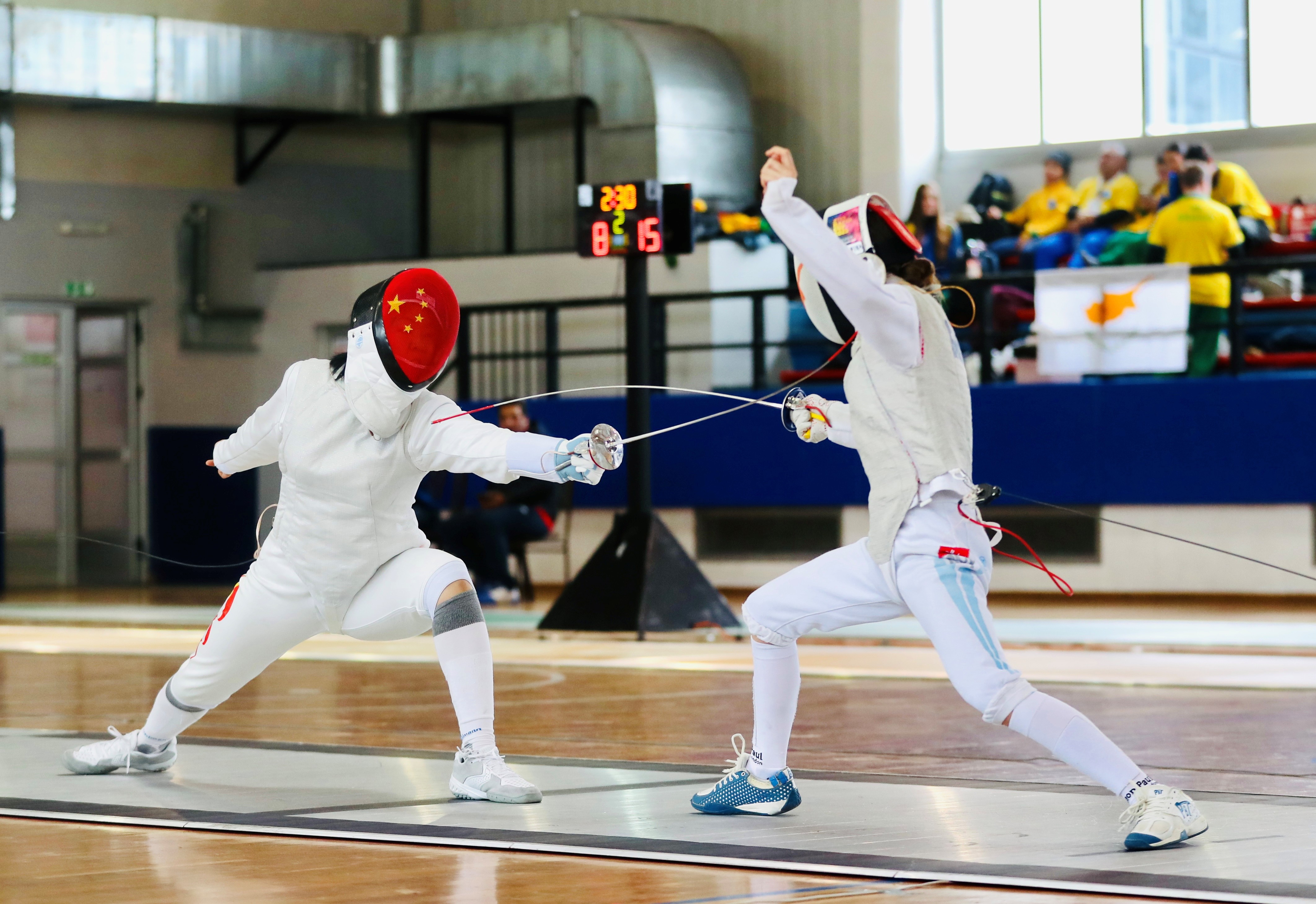 閔文珺（左）在比賽中。圖片來源：中國(guó)中學(xué)生體育代表團(tuán)